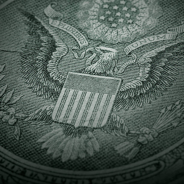 Great Seal of the United States - One Dollar Bill A macro shot of the Great Seal of the United States on the back of the one dollar bill. dollar bill eagle stock pictures, royalty-free photos & images