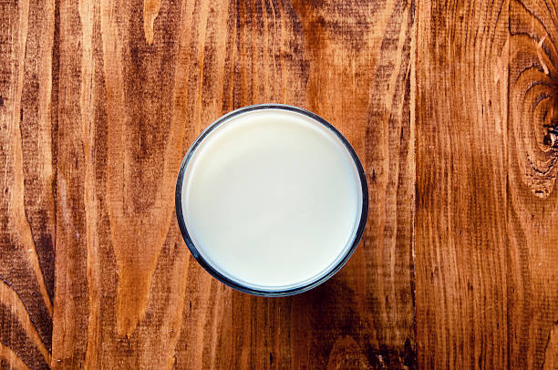 istock Milk on a wooden table 598227338