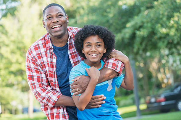 istock Father and mixed race preteen son 598227948