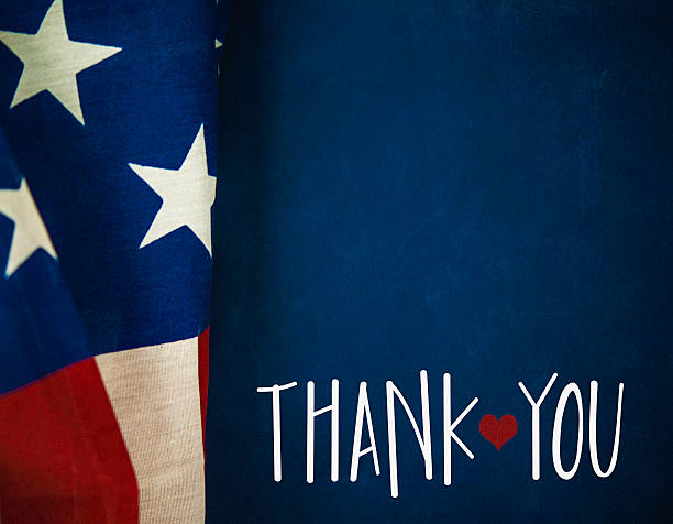 Chalkboard and flag with thank you message for US Veterans Chalkboard and flag with thank you message for US Veterans thank you veterans day stock pictures, royalty-free photos & images