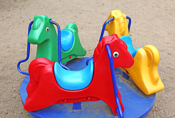istock horse toy playground 598229272