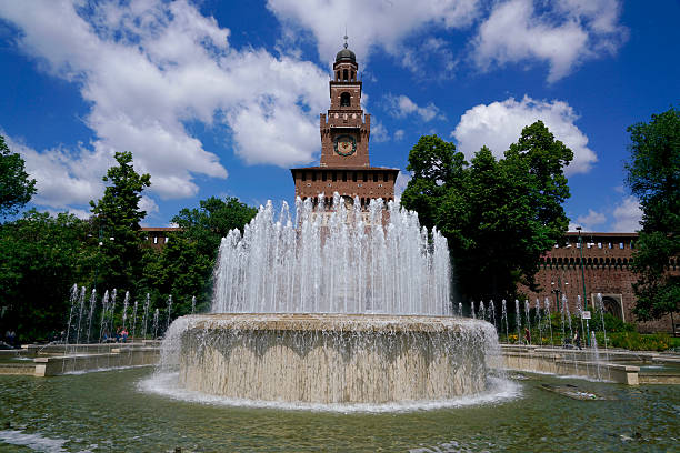 istock steeple behind a water fountain 598232054