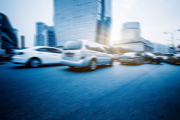 istock City road with moving traffic 598232644