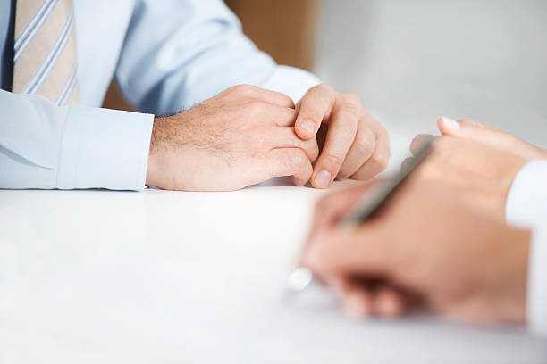istock Man Signing Contract Paper 598233512