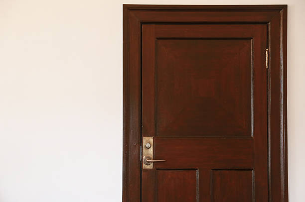 istock Wooden door and wall 598234474