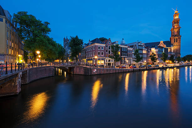 istock Famous view of Amsterdam Canal by night 598237732