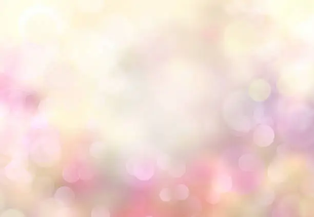 Photo of Spring abstract blurred bokeh light yellow background.