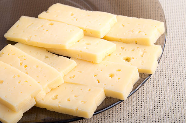istock Group pieces of hard dry yellow cheese 598240870