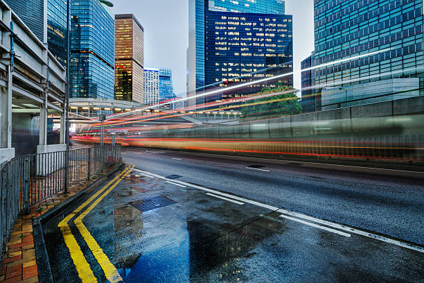 istock blurred traffic in downtown district,hong kong,china 598241746