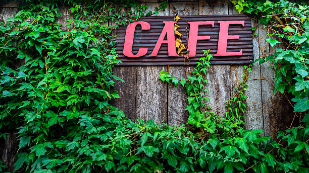 istock Red cafe sign on wooden wall 598242706