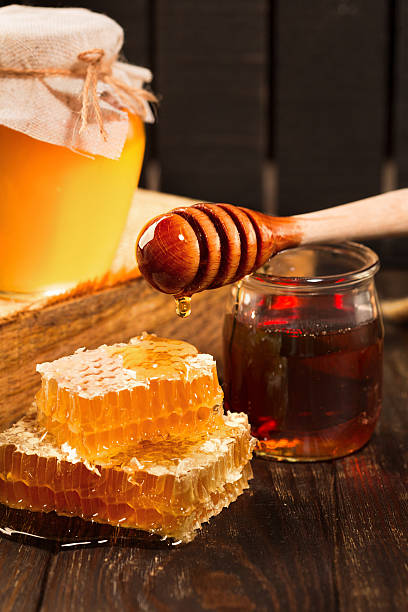 istock Honey in jar and honeycomb 598242734