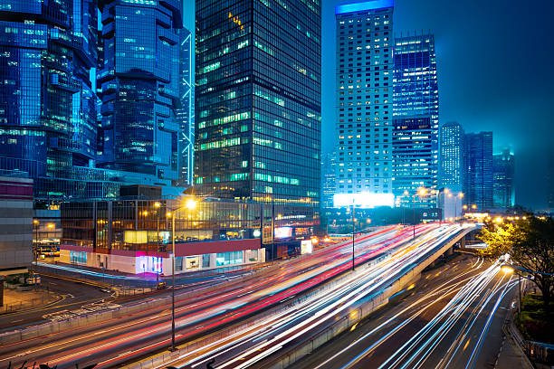 istock blurred traffic in downtown district,hong kong,china 598242780