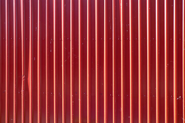 istock Red long goffered metal texture, corrugated steel 598243448