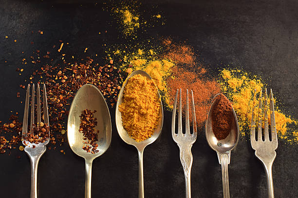 istock Spices in the antiqe forks and spoons 598245694