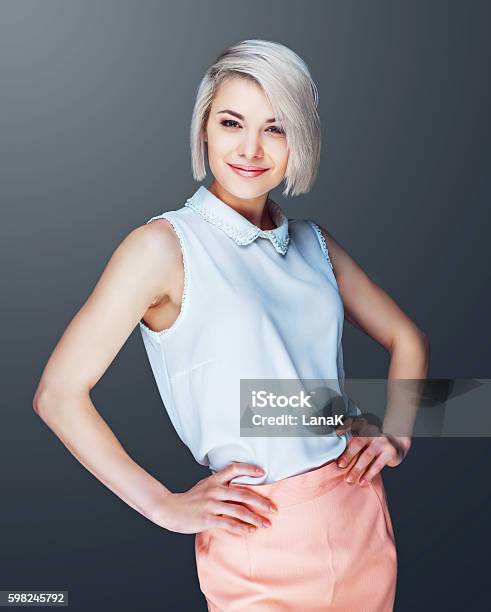 Confident Smiling Woman Stock Photo - Download Image Now - Short Hair, Blond Hair, Businesswoman