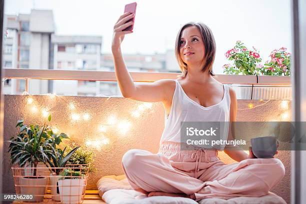 Selfie Moment On Terrace Stock Photo - Download Image Now - Balcony, Pallet - Industrial Equipment, Adolescence