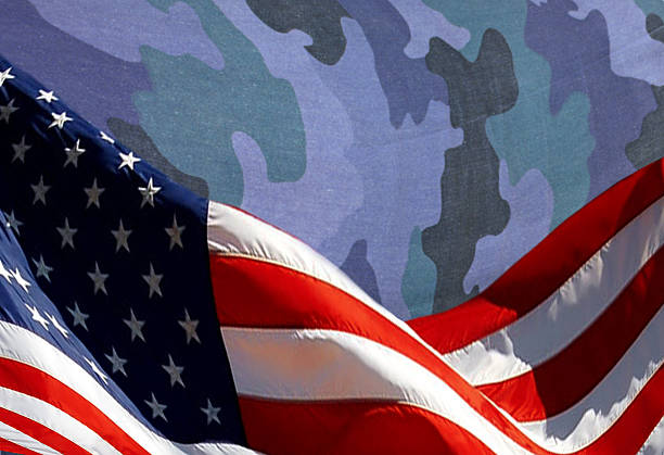 istock American flag and camouflage 598248568
