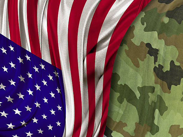 istock American flag and camouflage 598249570