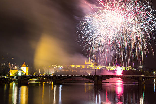 istock Fireworks in Prague over Vltava river, Castle and Charles bridge 598250990