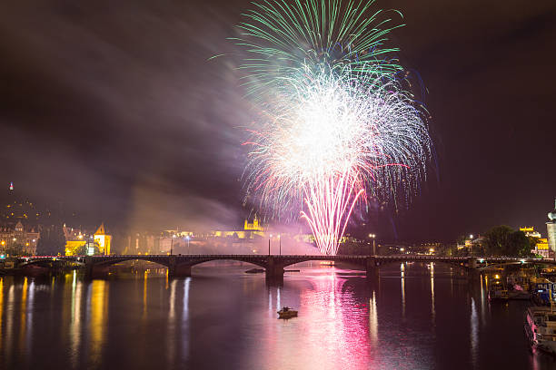 istock Fireworks in Prague over Vltava river, Castle and Charles bridge 598251134