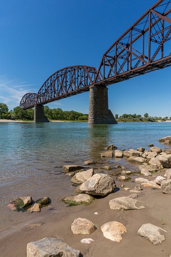 A railroad bridge crossing the Missouri River.