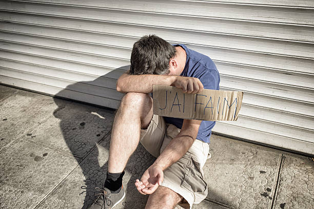 istock Hungry Man Begging for Money 598251434