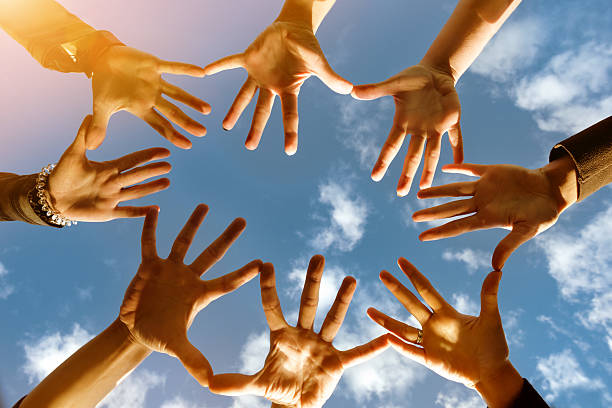 istock Friendsship team concept with many hands in circle 598251796