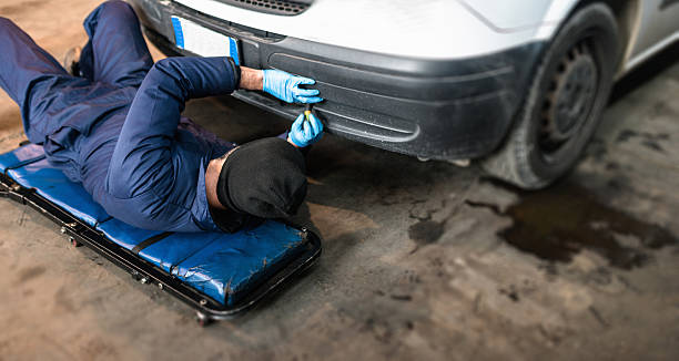istock car repairman on the garage 598252376
