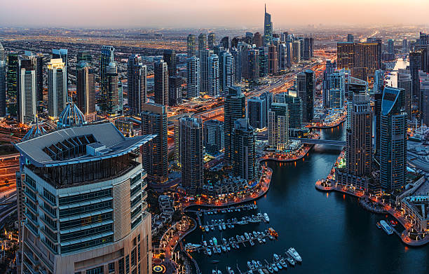 istock Illuminated architecture of Dubai by night. Scenic skyline. 598252408