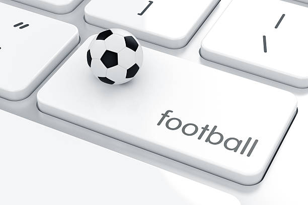 istock Football ball on the computer keyboard 598254268