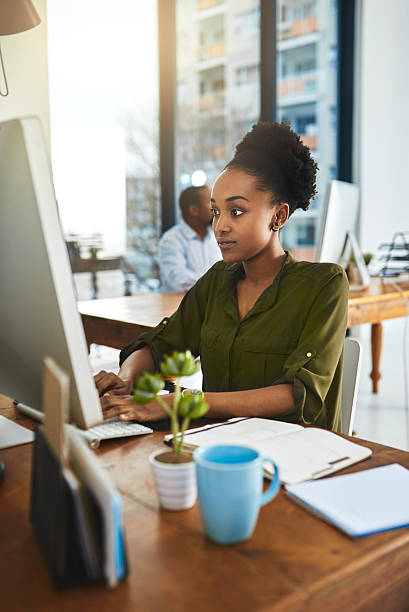 istock Fully focused on the task in front of her 598255436