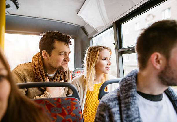 istock Group of young people traveling by bus, having fun 598258192