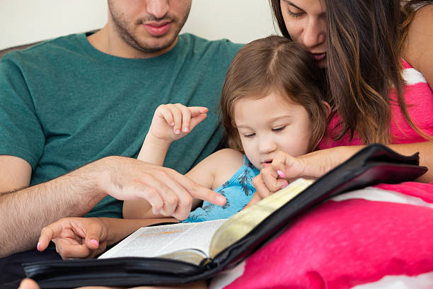 istock Family Reading the Bible Together 598258406