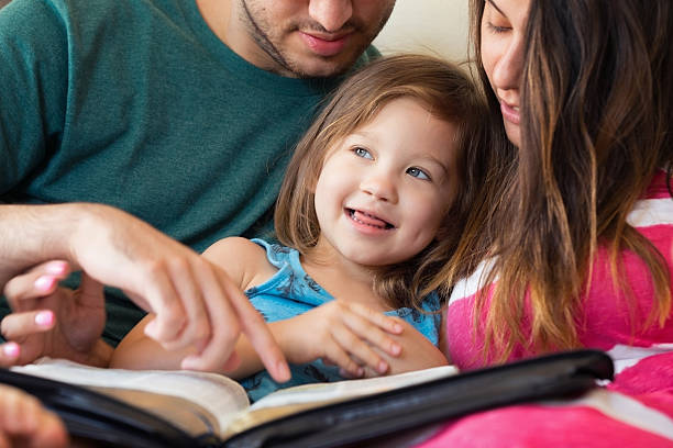 istock Family Reading the Bible Together 598258616