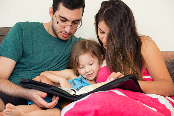 istock Family Reading the Bible Together 598259370