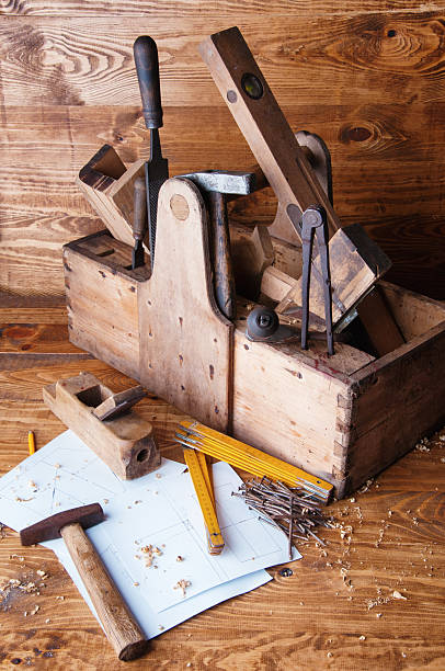 istock Planer carpenter on a wooden background 598259706