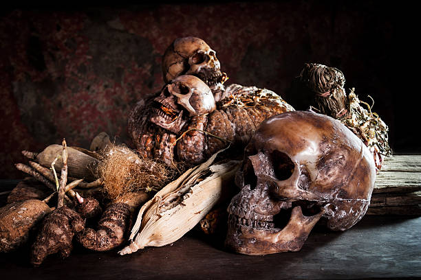istock Still Life with a Skull and fruit on wooden 598260244