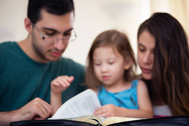 istock Family Reading the Bible Together 598261200