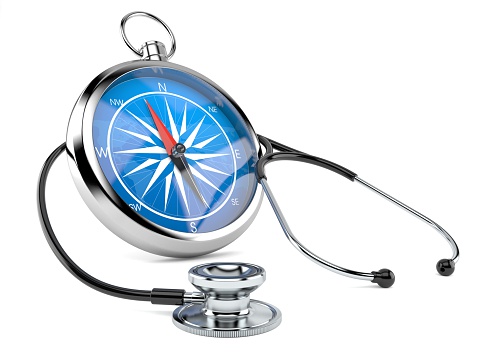 Stethoscope with compass isolated on white background