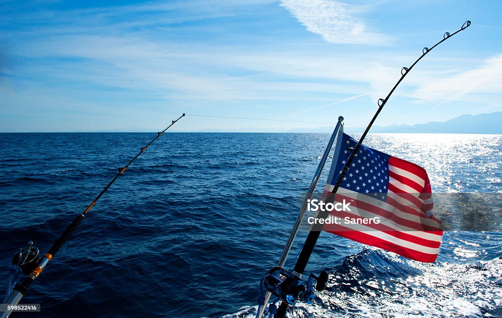 American Flag And Deep Sea Fishing Rod Stock Photo - Download Image Now -  American Flag, Fishing, Nautical Vessel - iStock