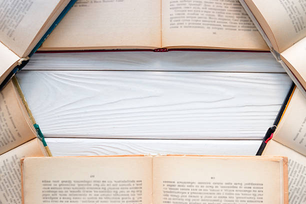 istock Open vintage book on white background with space for text 598522796