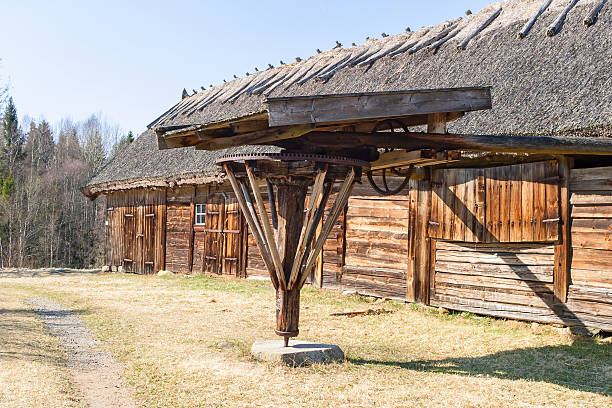 istock Old weathered barn with a animal mill 598524964