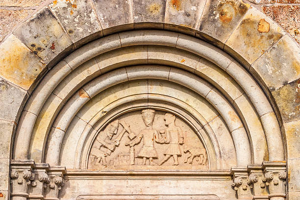 istock Biblical reliefs on an old church wall 598525076