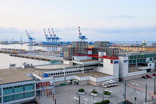 Genova, Italy - August 18, 2016: aerial view of Grandi Navi Veloci offices and pier at Genova port.
