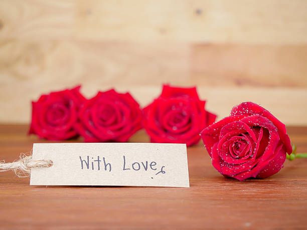 istock Handwriting With Love on brown label paper 3 598528918