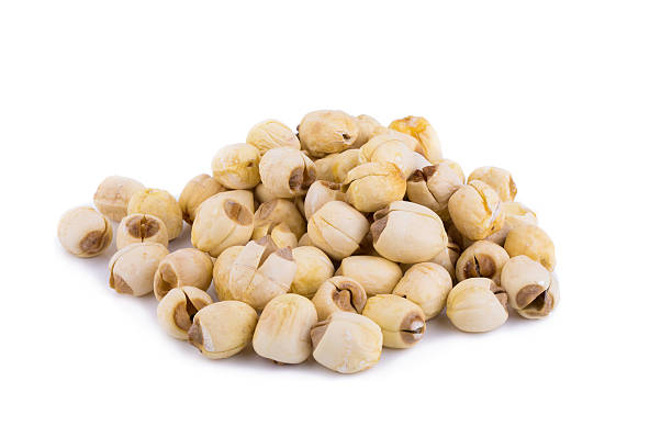 istock Dried lotus seeds on white background 598529054