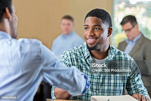 Handsome Young African American Man At Job Interview Stock Photo - Download Image Now