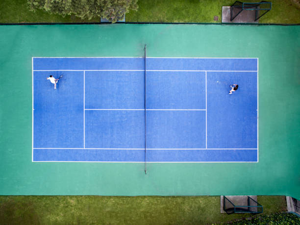 Aerial view of tennis court Aerial view of tennis court baseline stock pictures, royalty-free photos & images