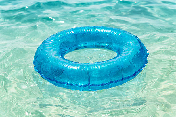 istock Rubber ring floating in the clear blue sea Pedn Vounder 598530190