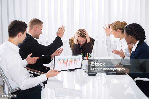 Upset Businesswoman In Meeting Stock Photo - Download Image Now - Meeting, Business Meeting, Arguing